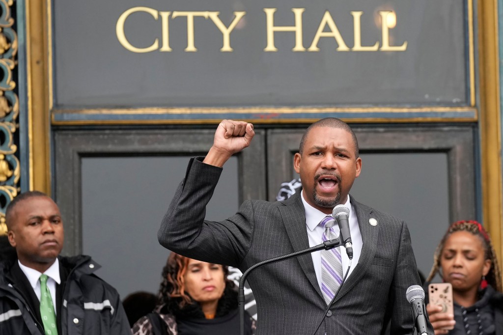 Supervisor Shamann Walton speaks at a reparations rally outside of San Francisco City Hall.