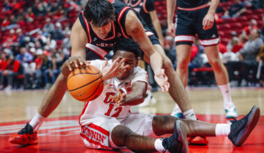 UNLV guard Issac Williamson (12) fights for possession of the ball during an NCAA basketball ga ...