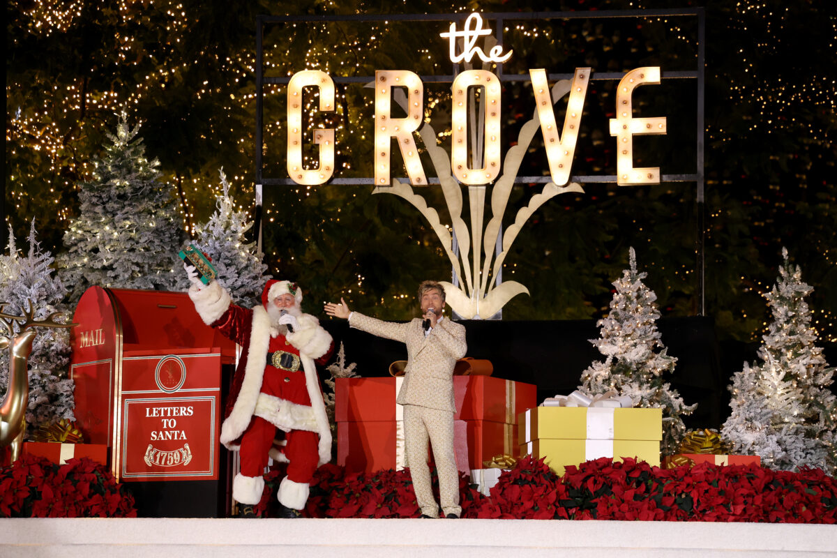 LOS ANGELES, CALIFORNIA - NOVEMBER 17: Lance Bass and Santa Claus (L) perform during the Christmas at The Grove: 24th Annual Tree Lighting Celebration on November 17, 2025 in Los Angeles, California. (Photo by Jesse Grant/Getty Images for Caruso)
