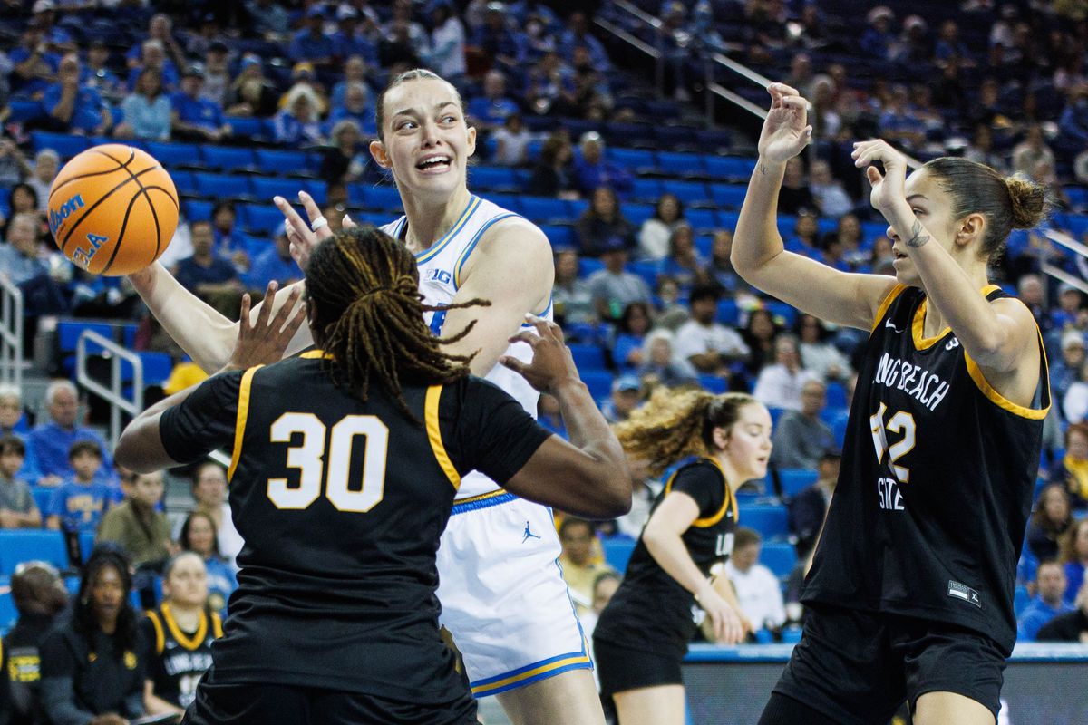 UCLA Bruins forward Angela Dugalić (32) attempts to pass the ball during an NCAA basketball game against the Long Beach State, Saturday December 20, 2025 in Los Angeles, Calif.