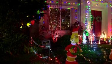 Sacramento families adjust holiday displays at Rockmont Circle as strong winds approach