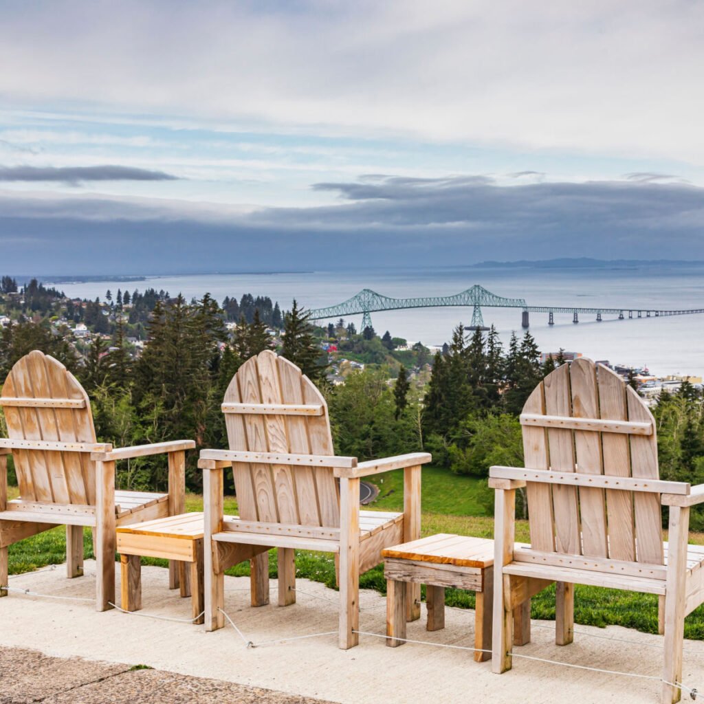 3 chairs overlooking Astoria Oregon  astounding scenery