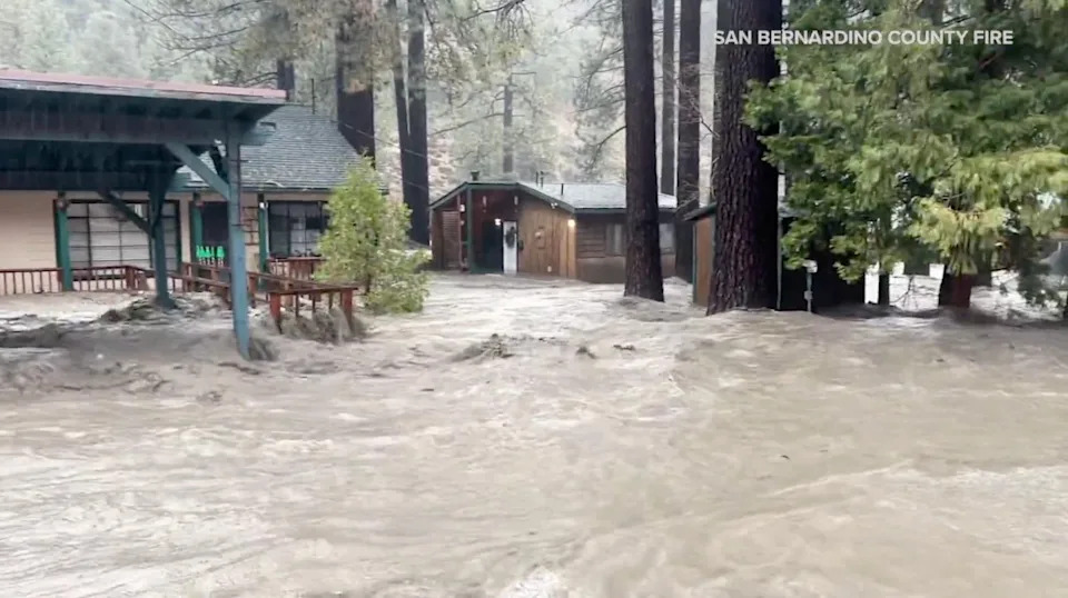 Flood waters partially submerged homes after torrential rains in San Bernardino County, California, on Dec. 24, 2025. / Credit: San Bernardino County Fire/Handout via REUTERS