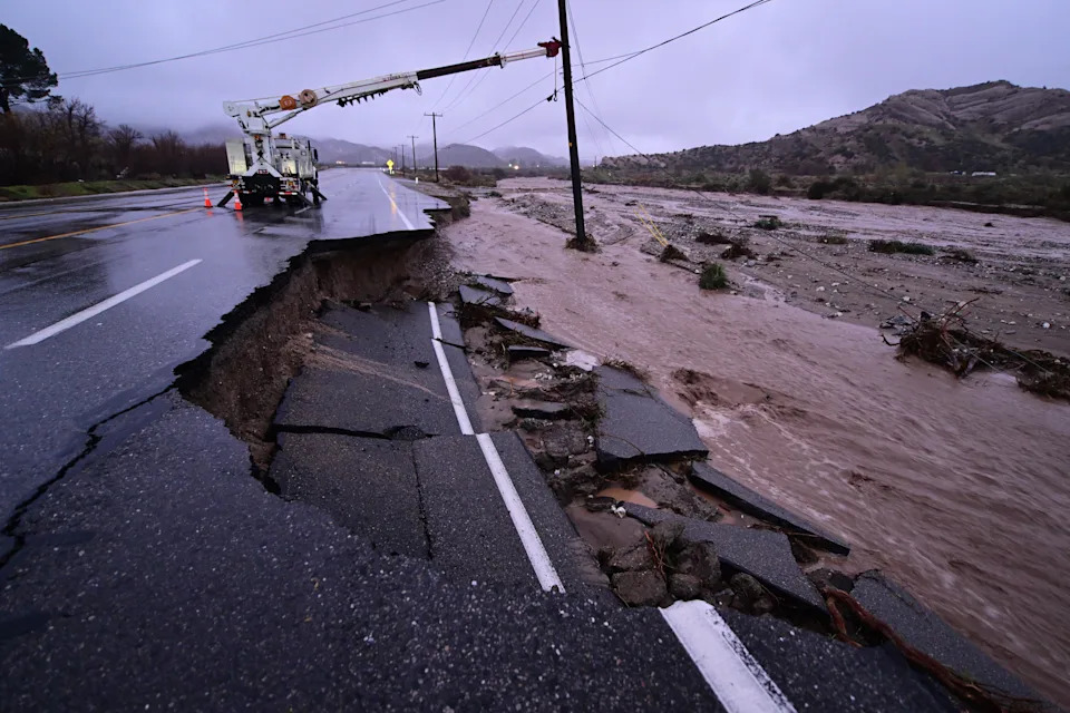 Part of California State Route 138 washed away from flooding on Dec. 24, 2025, outside of Wrightwood, Calif. / Credit: Wally Skalij / AP