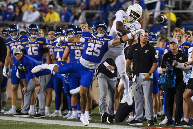 South Dakota State Jackrabbits safety Koby Bretz (25) and Sacramento State Hornets wide receiver Jordan Anderson (3) miss the catch on towards the sideline on Saturday, Aug. 30, 2025, at Dana J. Dykhouse Stadium in Brookings, South Dakota.