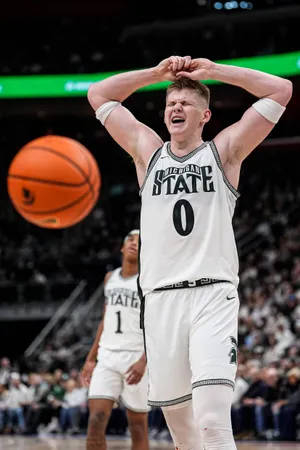 Michigan State forward Jaxon Kohler (0) reacts to a play against Oakland during the first half at Little Caesars Arena in Detroit on Saturday, Dec. 20, 2025.