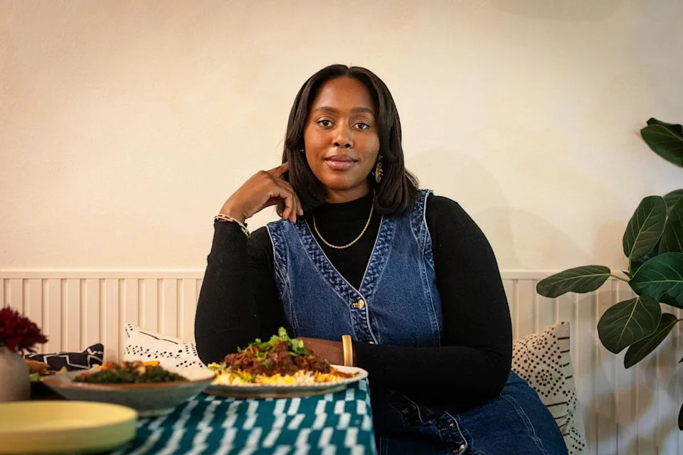 A woman poses for the camera.