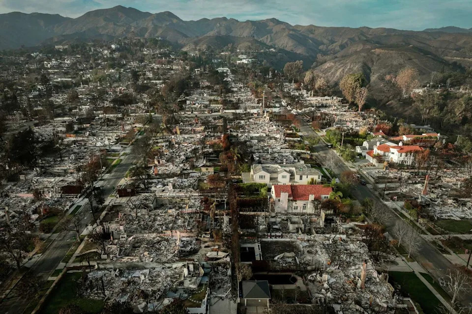 Few homes remained standing in this Pacific Palisades neighborhood on Feb. 3, following the devastating Los Angeles fires. The natural disaster in believed to contribute to the city's population decline. (Brontë Wittpenn/The Chronicle)