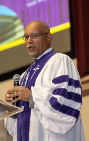 Newly appointed pastor Don F. Harris speaks to the congregation gathered for Sunday service at the 40th anniversary celebration. Russell Stiger Jr., OBSERVER
