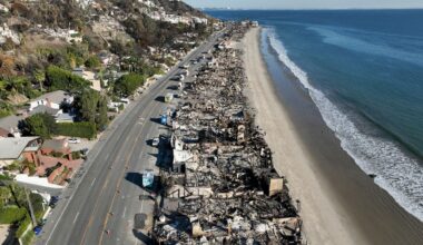 An aerial view shows the devastation from the Palisades Fire on beachfront homes, Jan. 15, 2025 in Malibu, Calif. (AP Photo/Jae C. Hong, File)
