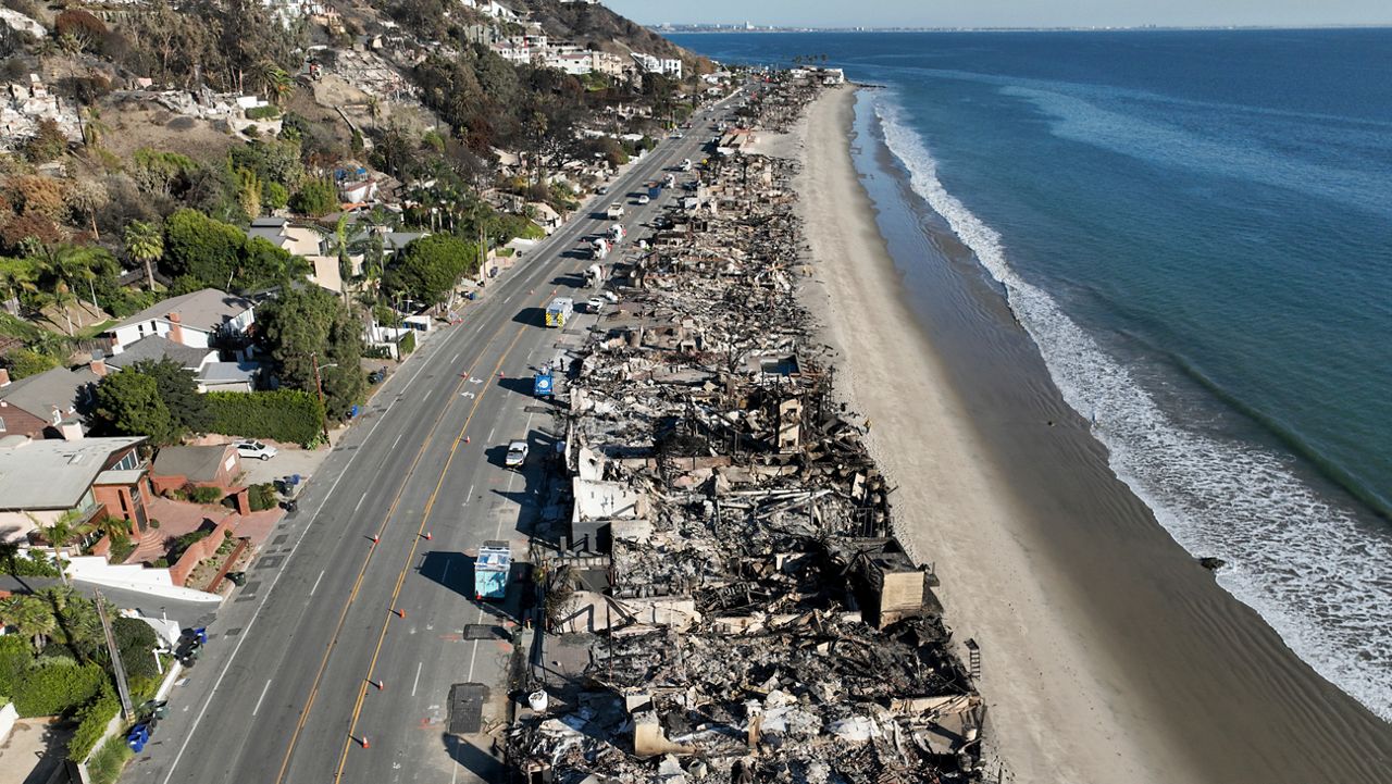 An aerial view shows the devastation from the Palisades Fire on beachfront homes, Jan. 15, 2025 in Malibu, Calif. (AP Photo/Jae C. Hong, File)