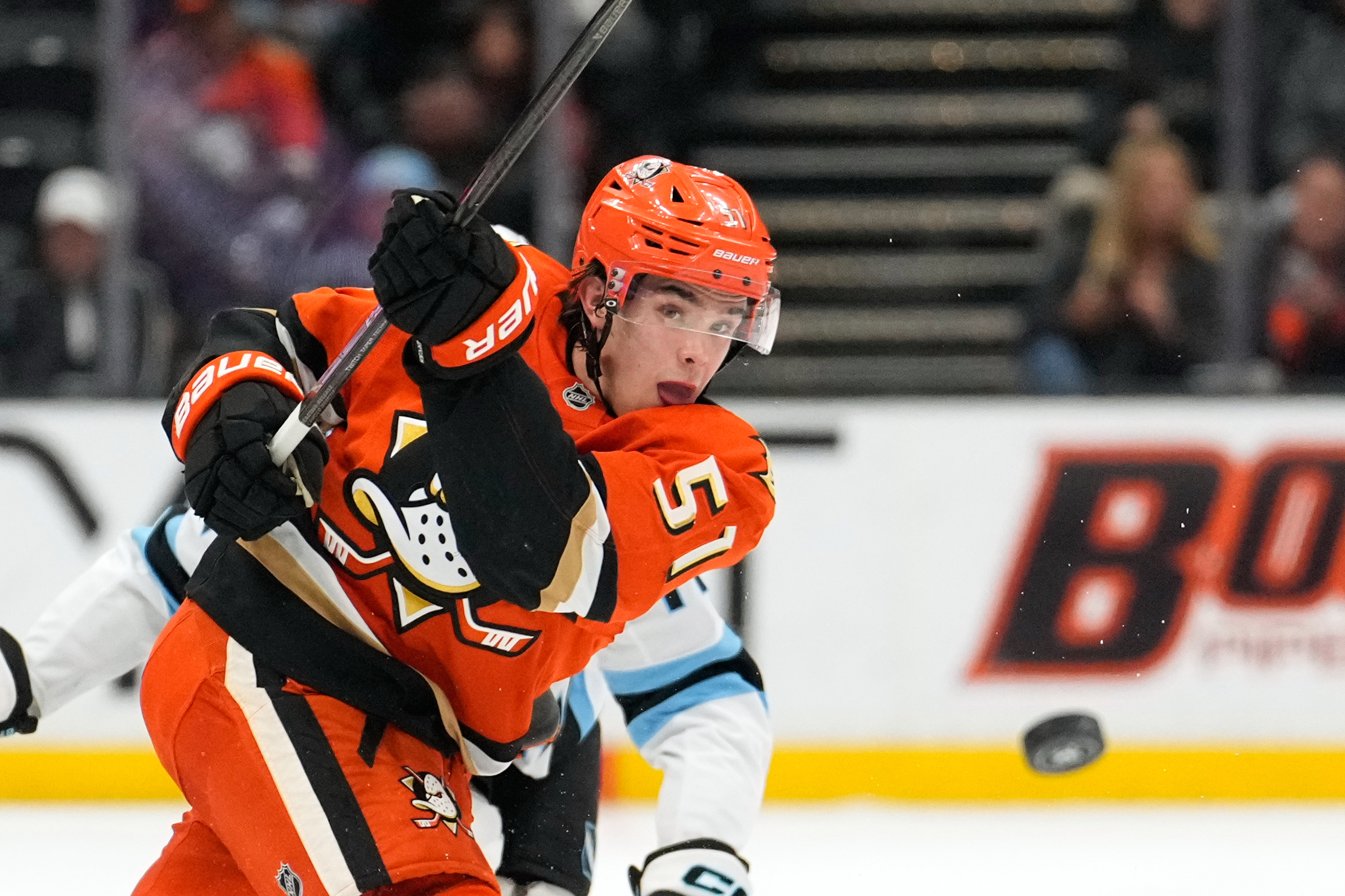 Ducks defenseman Olen Zellweger passes the puck during the first...
