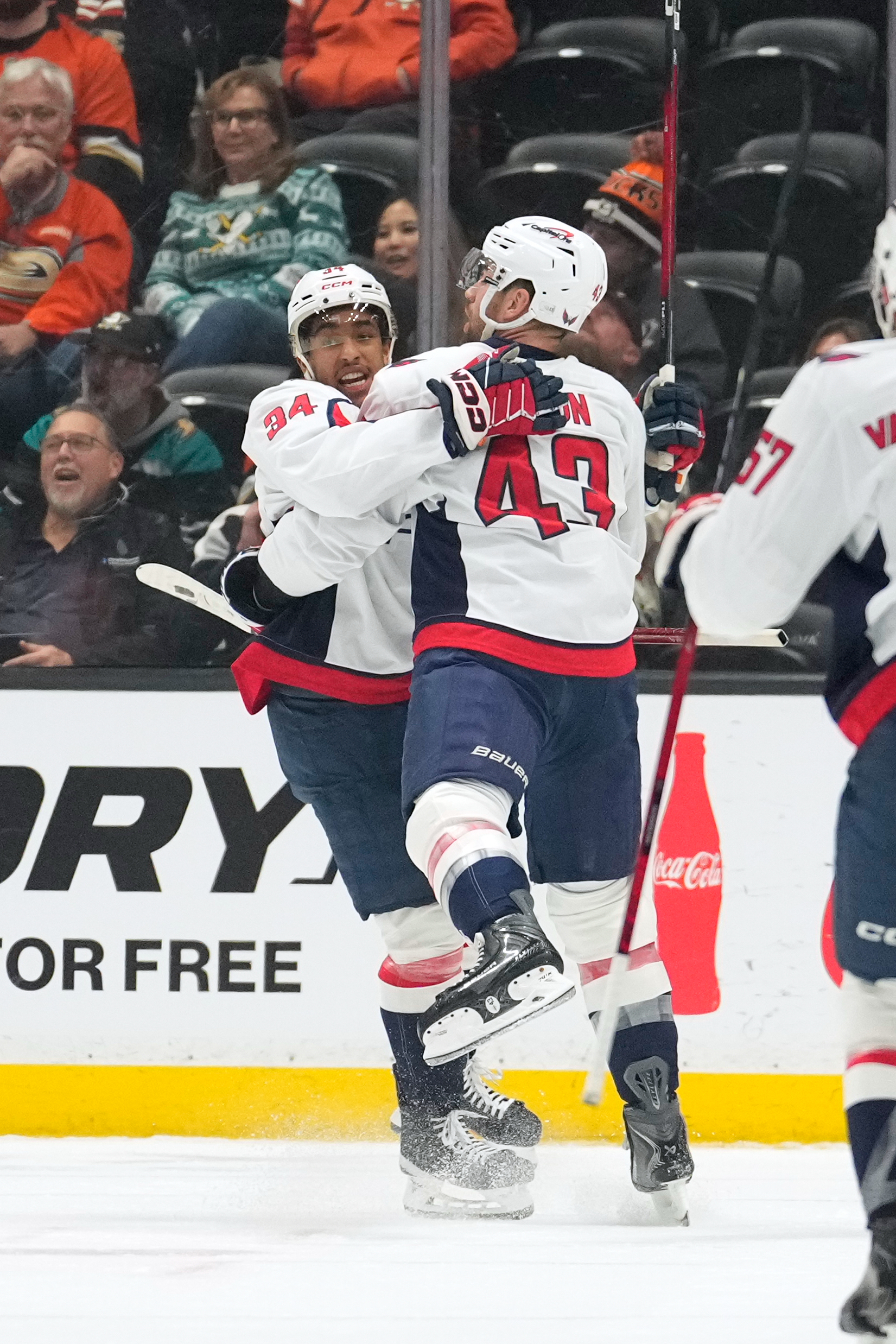Washington Capitals defenseman Declan Chisholm, right, celeb rates his goal...