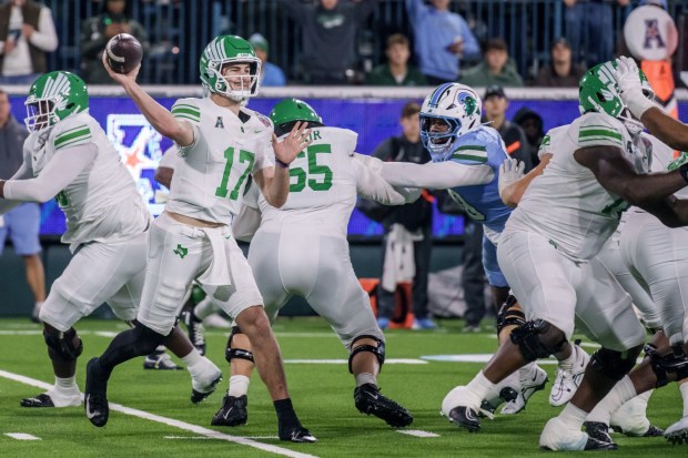 North Texas quarterback Drew Mestemaker (17) throws during the second half of the American Conference championship NCAA college football game against Tulane in New Orleans, Friday, Dec. 5, 2025. (AP Photo/Matthew Hinton)