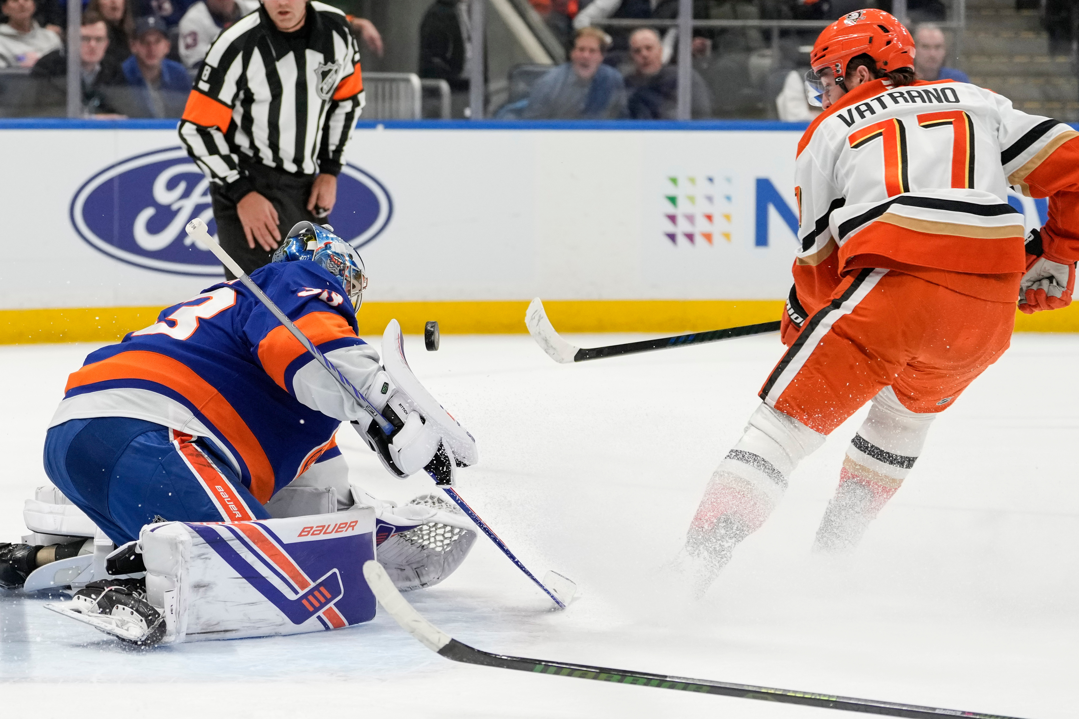 New York Islanders goaltender David Rittich stops a puck shot...