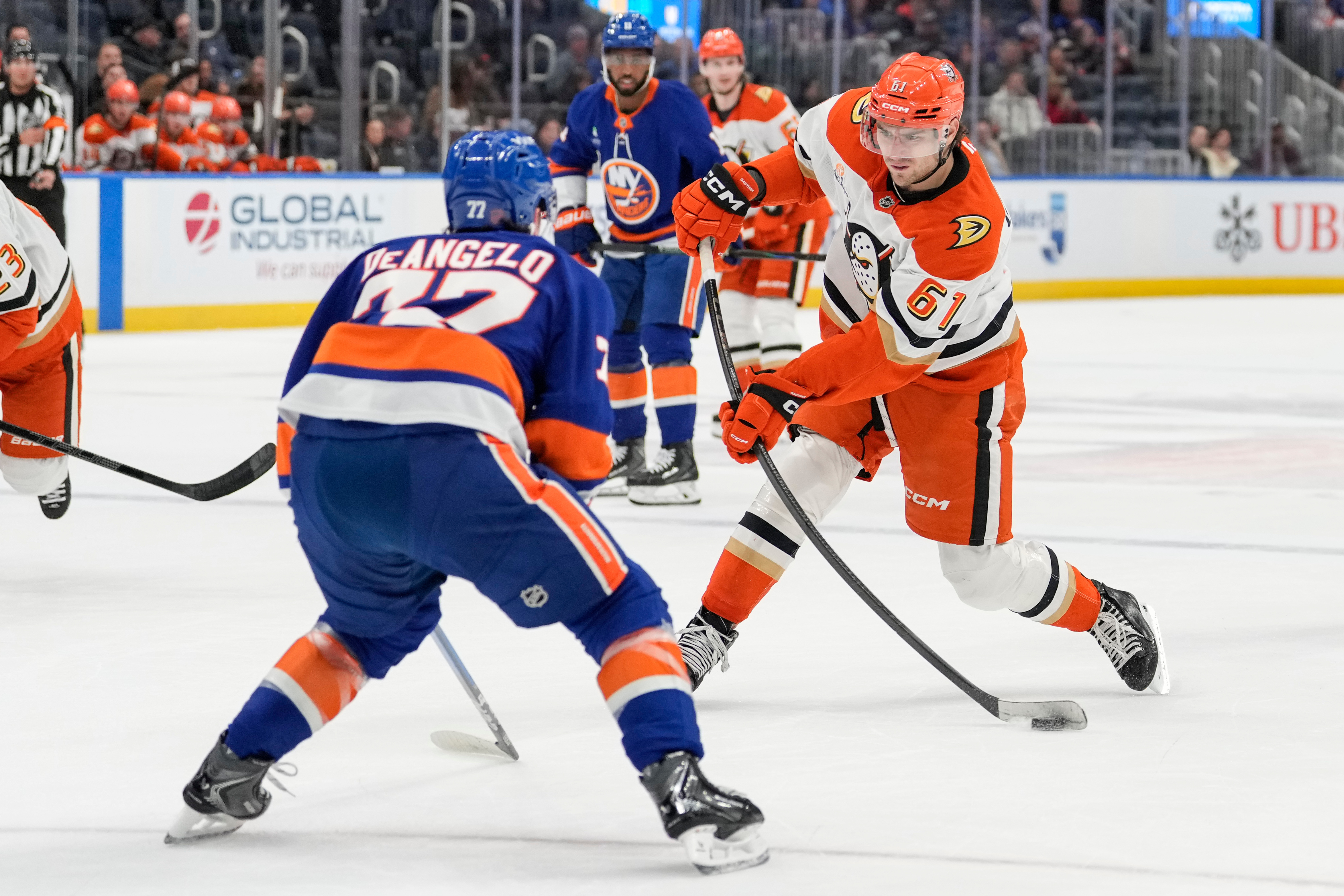 Ducks left wing Cutter Gauthier, right, shoots the puck during...