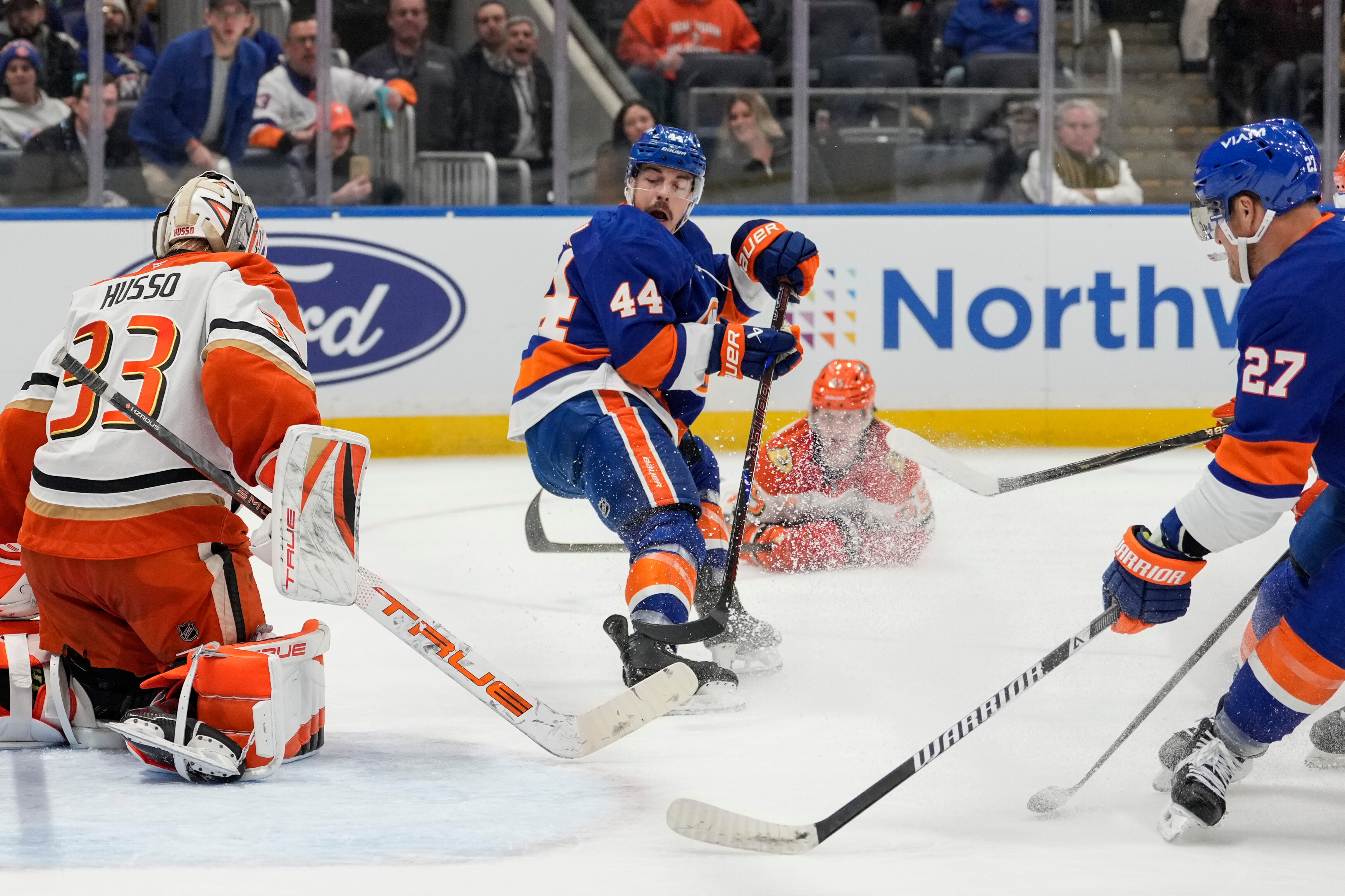 New York Islanders center Jean-Gabriel Pageau (44) attempts to takes...