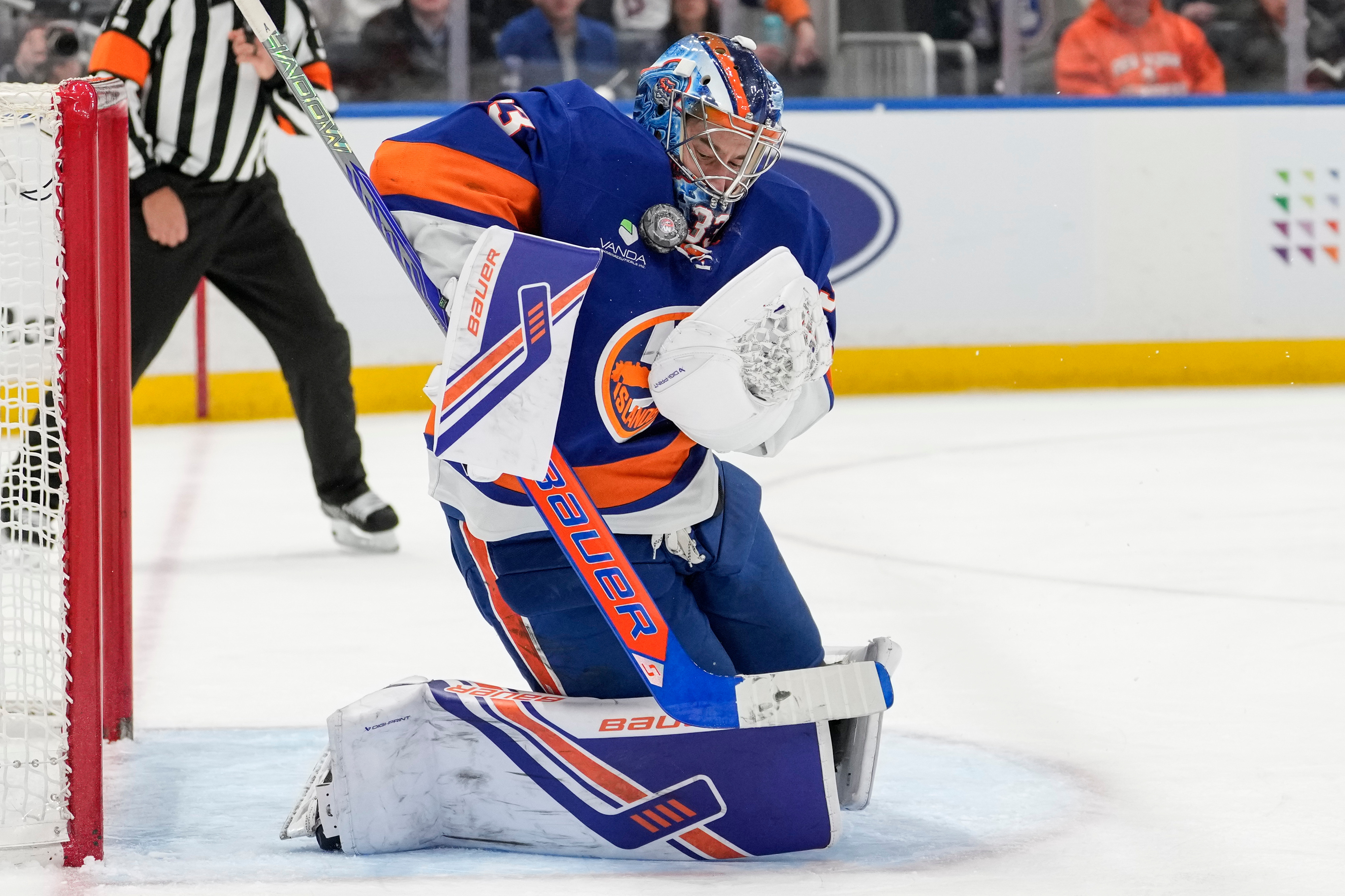 New York Islanders goaltender David Rittich stops a shot during...