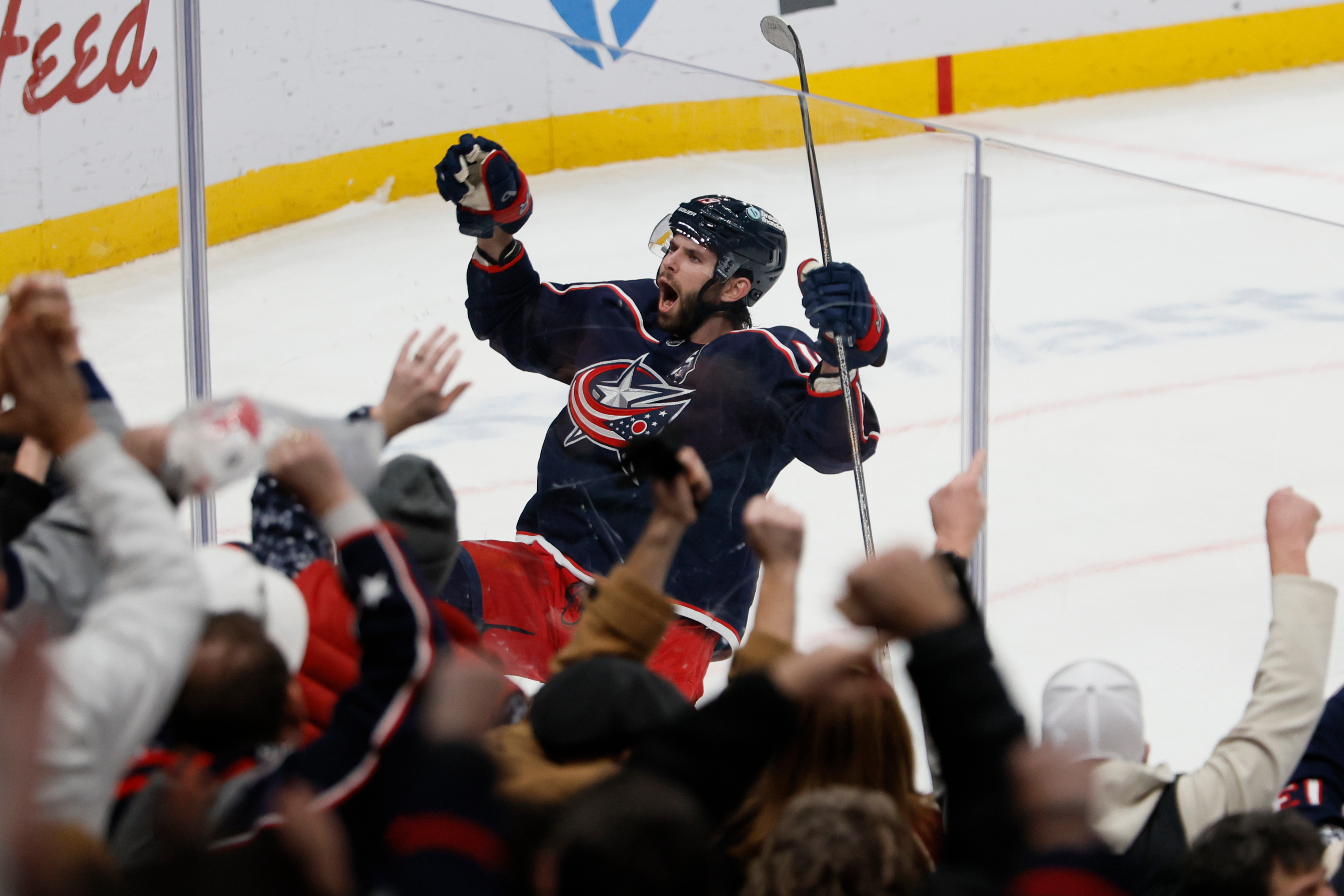 The Columbus Blue Jackets’ Adam Fantilli celebrates his game-winning overtime...