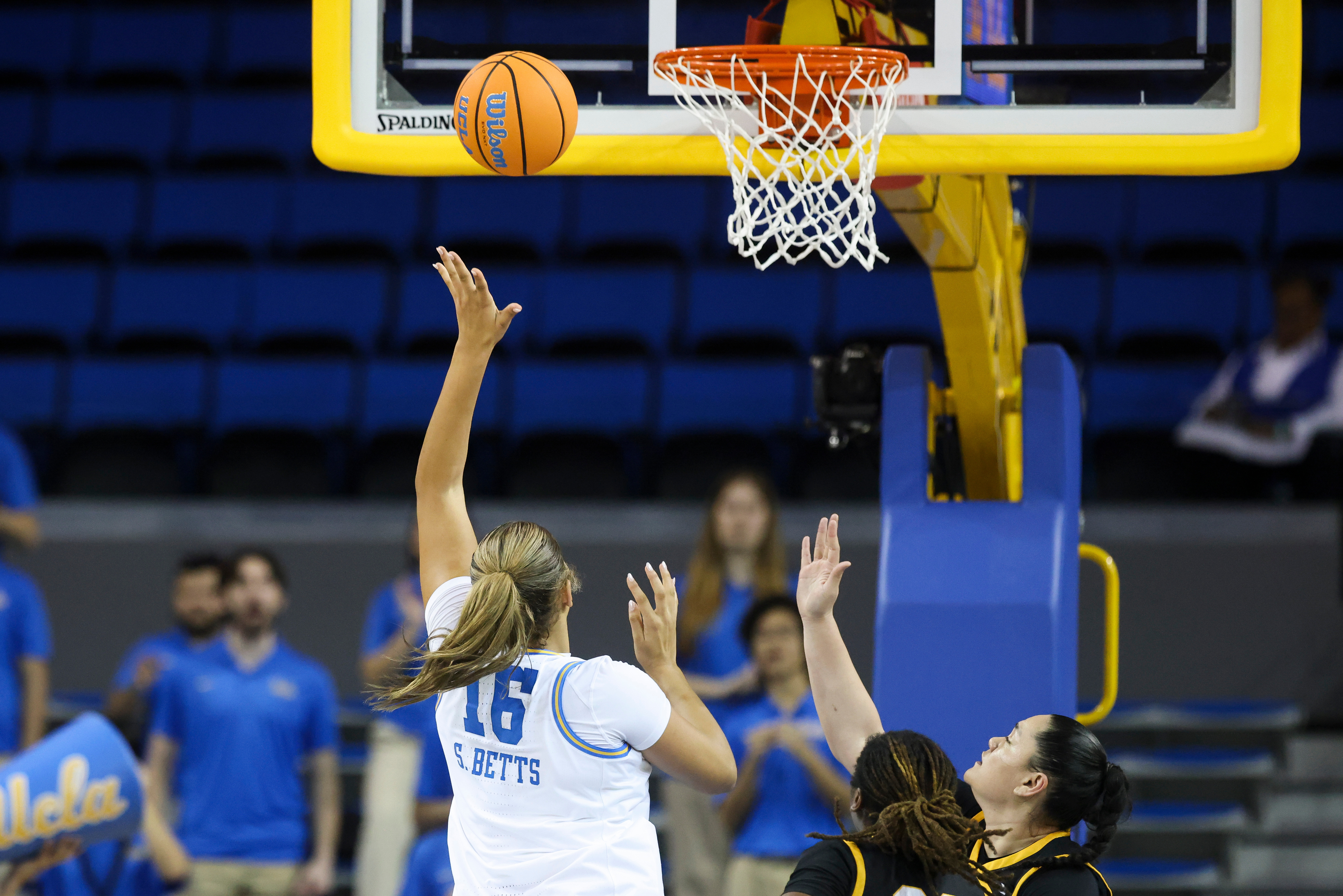 UCLA forward Sienna Betts (16) shoots as Long Beach State...