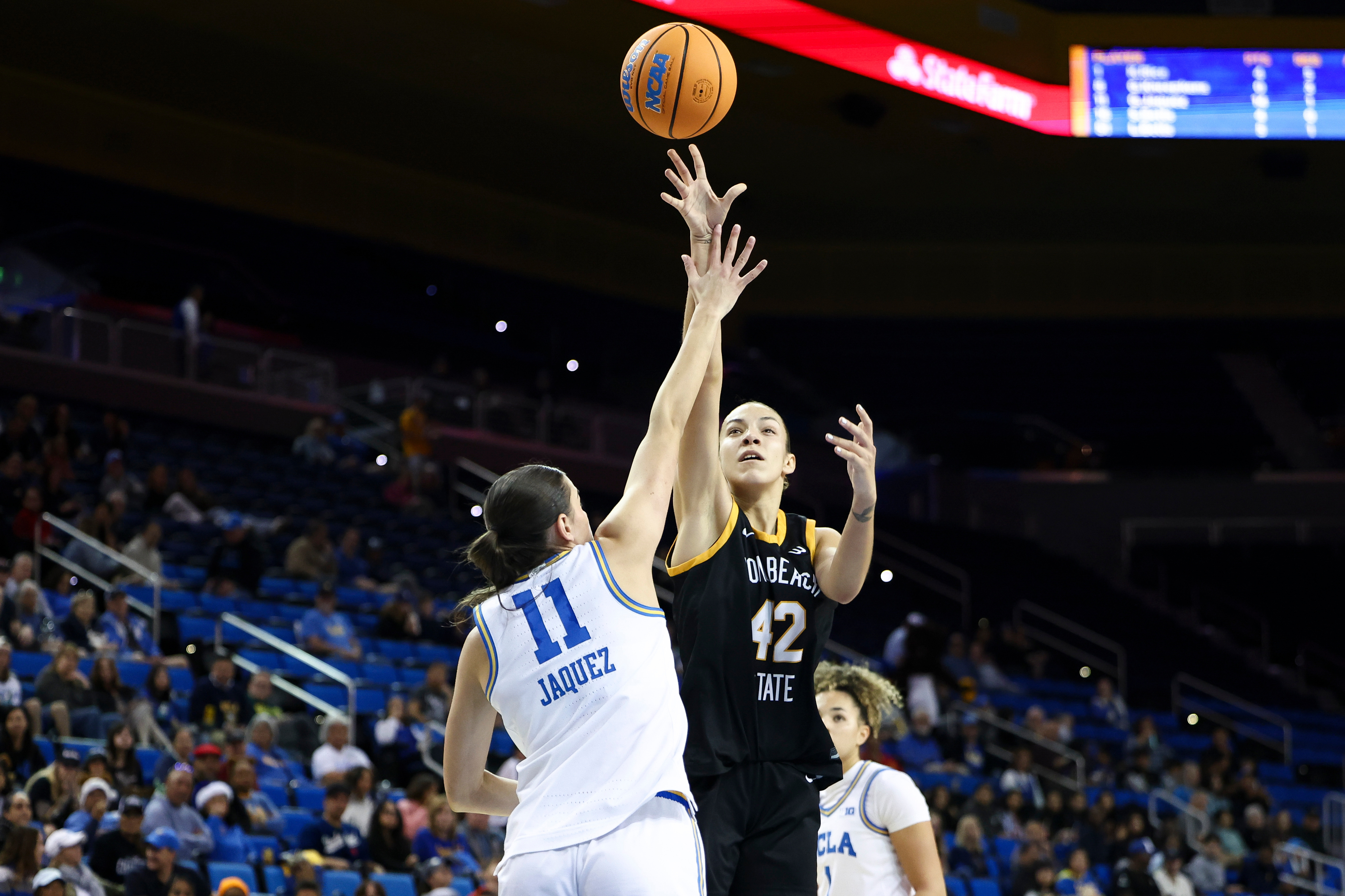 Long Beach State forward Judit Oliva Fernandez (42) shoots against...