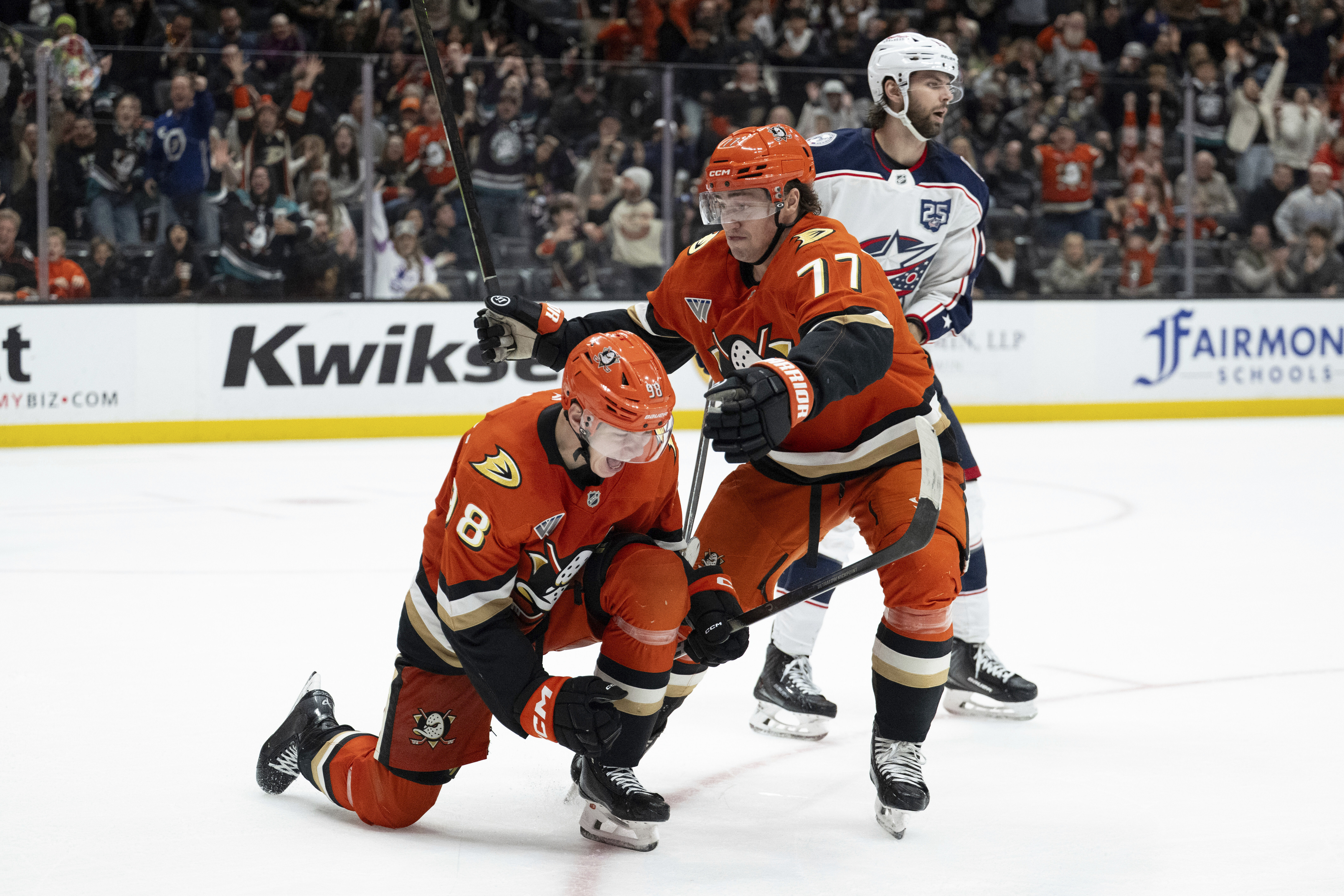 Ducks defenseman Pavel Mintyukov, left, and right wing Frank Vatrano...