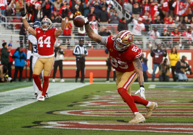 San Francisco 49ers' George Kittle (85) celebrates his touchdown catch against the Tennessee Titans in the third quarter at Levi's Stadium in Santa Clara, Calif., on Sunday, Dec. 14, 2025. (Nhat V. Meyer/Bay Area News Group)