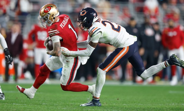 San Francisco 49ers' Ricky Pearsall (1) makes a catch against Chicago Bears' Nahson Wright (26) in the second quarter at Levi's Stadium in Santa Clara, Calif., on Sunday, Dec. 28, 2025. (Nhat V. Meyer/Bay Area News Group)