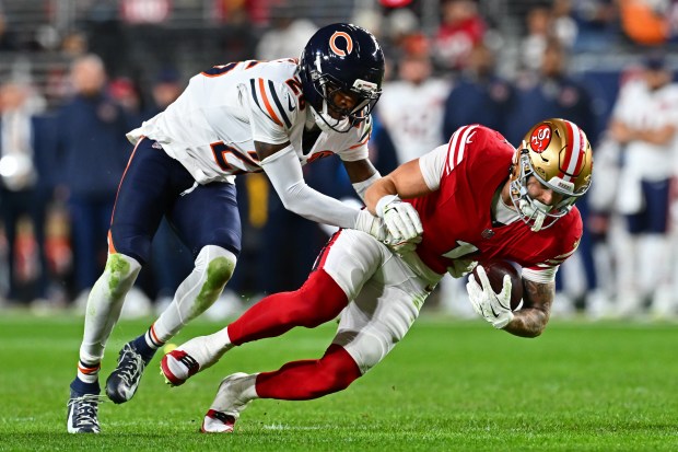 San Francisco 49ers' Ricky Pearsall (1) makes reception in front of Chicago Bears' Nahson Wright (26) in the second quarter of their NFL game at Levi's Stadium in Santa Clara, Calif., on Sunday, Dec. 28, 2025. (Jose Carlos Fajardo/Bay Area News Group)