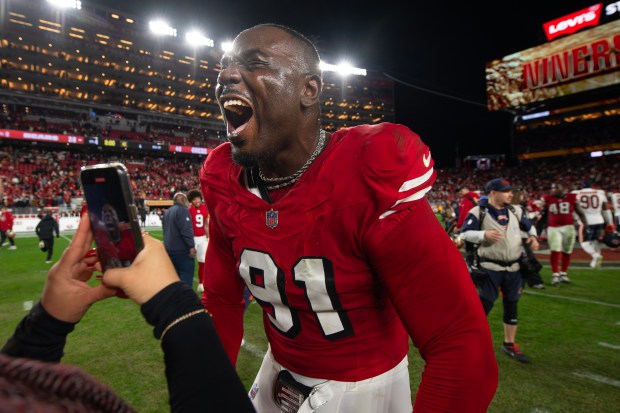 San Francisco 49ers' Sam Okuayinonu (91) celebrates after defeating the Chicago Bears during their NFL game at Levi's Stadium in Santa Clara, Calif., on Sunday, Dec. 28, 2025. The San Francisco 49ers defeated the Chicago Bears 42-38. (Jose Carlos Fajardo/Bay Area News Group)