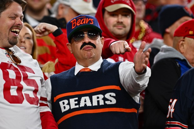 San Francisco 49ers fans make fun of a Chicago Bears fan dressed as former Bears coach Mike Ditka in the fourth quarter of their NFL game at Levi's Stadium in Santa Clara, Calif., on Sunday, Dec. 28, 2025. The San Francisco 49ers defeated the Chicago Bears 42-38. (Jose Carlos Fajardo/Bay Area News Group)