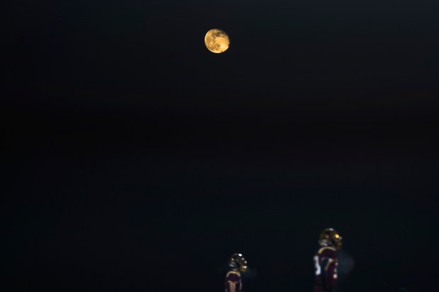 The moon shines during a game between El Cerrito and Menlo-Atherton during the NorCal Division 4-A championship at Menlo-Atherton High School in Atherton, Calif., on Saturday, Dec. 6, 2025. (Shae Hammond/Bay Area News Group)