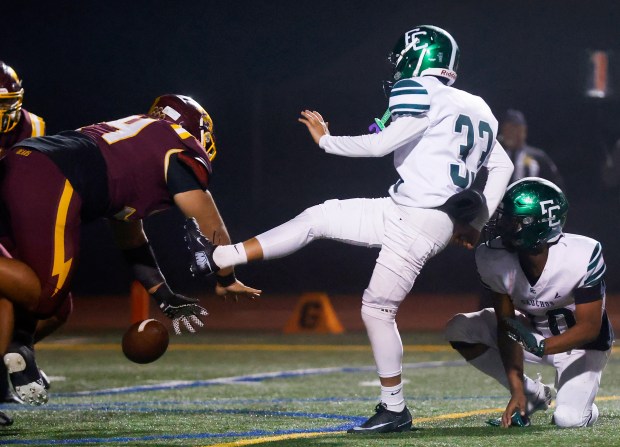 El Cerrito's Edson Campos (33) kick is blocked by Menlo-Atherton's John Niko (54) in the third quarter during the NorCal Division 4-A championship at Menlo-Atherton High School in Atherton, Calif., on Saturday, Dec. 6, 2025. (Shae Hammond/Bay Area News Group)