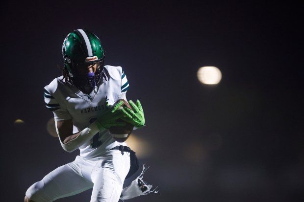 El Cerrito's Gary Youngblood (1) catches the ball against Menlo-Atherton in the third quarter during the NorCal Division 4-A championship at Menlo-Atherton High School in Atherton, Calif., on Saturday, Dec. 6, 2025. (Shae Hammond/Bay Area News Group)