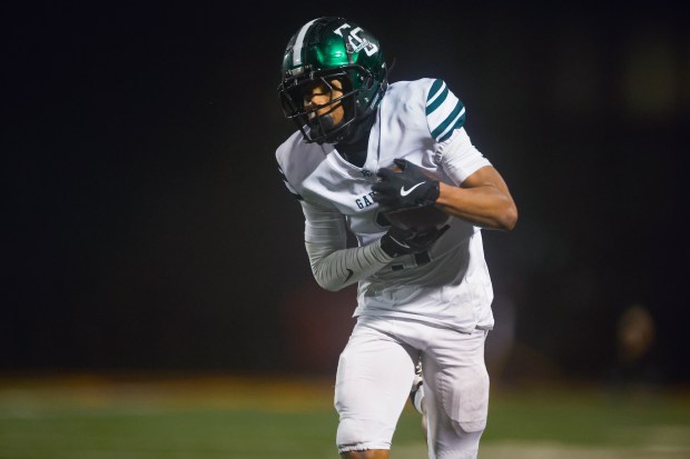El Cerrito's Mike Boyer (3) runs with the ball against Menlo-Atherton to score a touchdown in the third quarter during the NorCal Division 4-A championship at Menlo-Atherton High School in Atherton, Calif., on Saturday, Dec. 6, 2025. (Shae Hammond/Bay Area News Group)