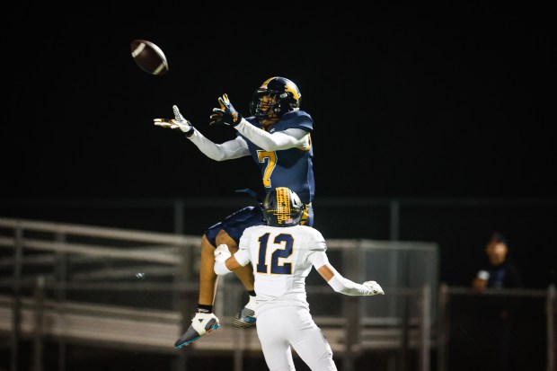 Lincoln's Michael Whitelaw (7) catches the ball against Gridley's Rafael Franco (12) in the first quarter during the CIF NorCal championship game at Lincoln High School in San Jose, Calif., on Friday, Dec. 5, 2025. (Shae Hammond/Bay Area News Group)