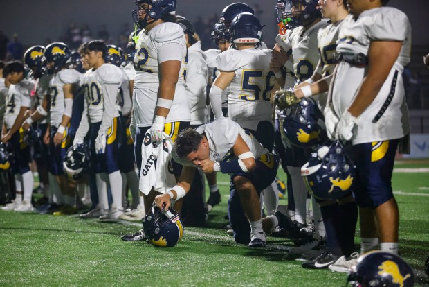 Lincoln's Russell Takeuchi (26) cries after Lincoln lost against Valley Center during Division 6-AA state football championship game at Fullerton Union High School District Stadium in Fullerton, Calif., on Friday, Dec. 12, 2025. (Shae Hammond/Bay Area News Group)