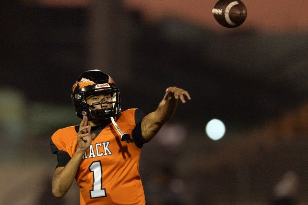 McClymonds quarterback Berell Staples (1) warms up before taking on Roseville in a CIF NorCal Division 3-A high school football championship game, Saturday, Dec. 6, 2025 in Oakland, Calif. (D. Ross Cameron for the Bay Area News Group)