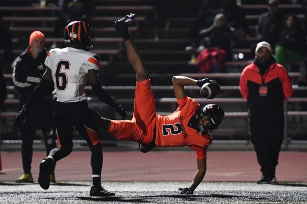 Pittsburg's RJ Mosley Jr. (2) makes a one handed touchdown catch against Central East's Jontae Della (6) in the first quarter of their CIF NorCal Division 1-A Championship game at Pittsburg High School in Pittsburg, Calif., on Saturday, Dec. 6, 2025. Central East defeats Pittsburg 55-36. (Jose Carlos Fajardo/Bay Area News Group)
