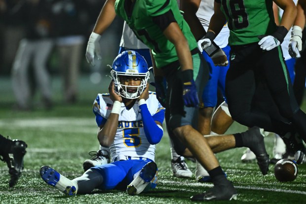 Serra quarterback William Orr (5) is sacked during the final play of the game as Saint Mary's players run off in celebration in the fourth quarter of their CIF NorCal Division 2-AA Championship game at Saint Mary's High School in Stockton, Calif., on Friday, Dec. 5, 2025. Saint Mary's defeated Serra 31-24. (Jose Carlos Fajardo/Bay Area News Group)