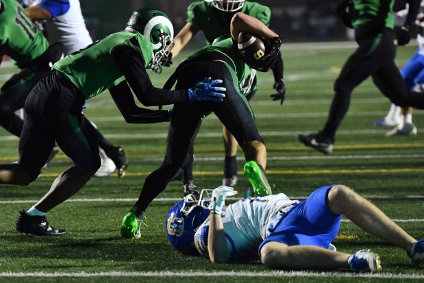 Saint Mary's Mason Eagal (2) intercepts a deflected pass intended for Serra's Charles Walsh (1) in the second quarter of their CIF NorCal Division 2-AA Championship game at Saint Mary's High School in Stockton, Calif., on Friday, Dec. 5, 2025. Saint Mary's defeated Serra 31-24. (Jose Carlos Fajardo/Bay Area News Group)