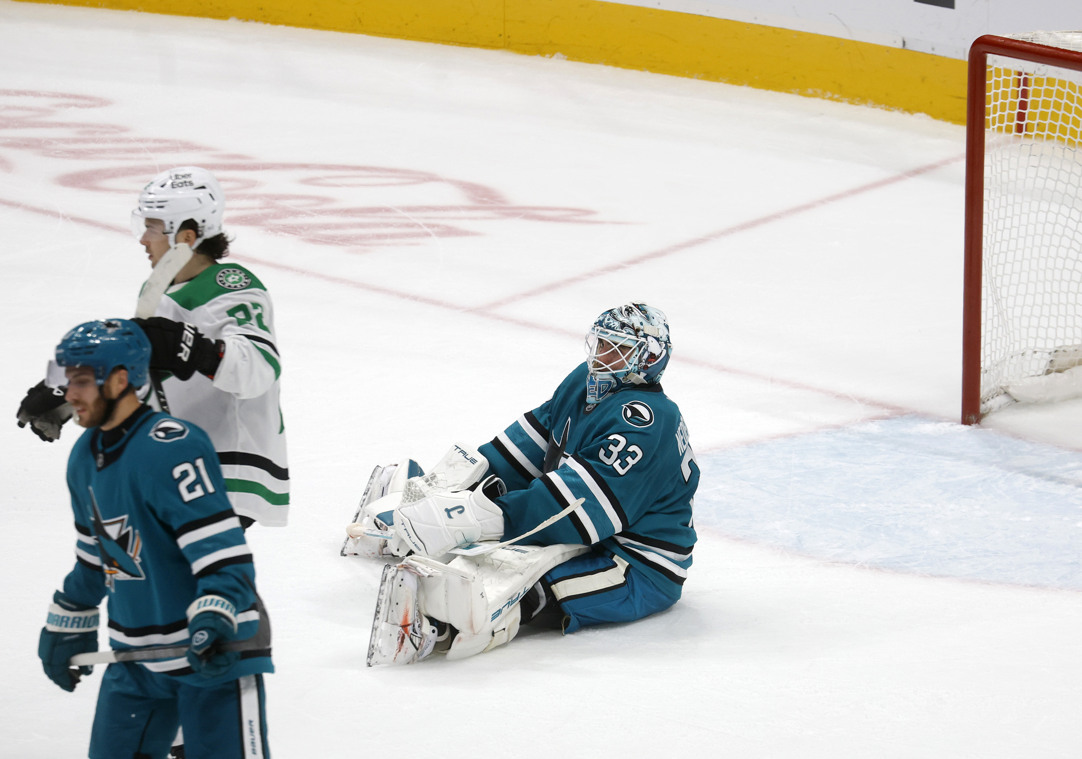 San Jose Sharks goaltender Alex Nedeljkovic (33) reacts after a...