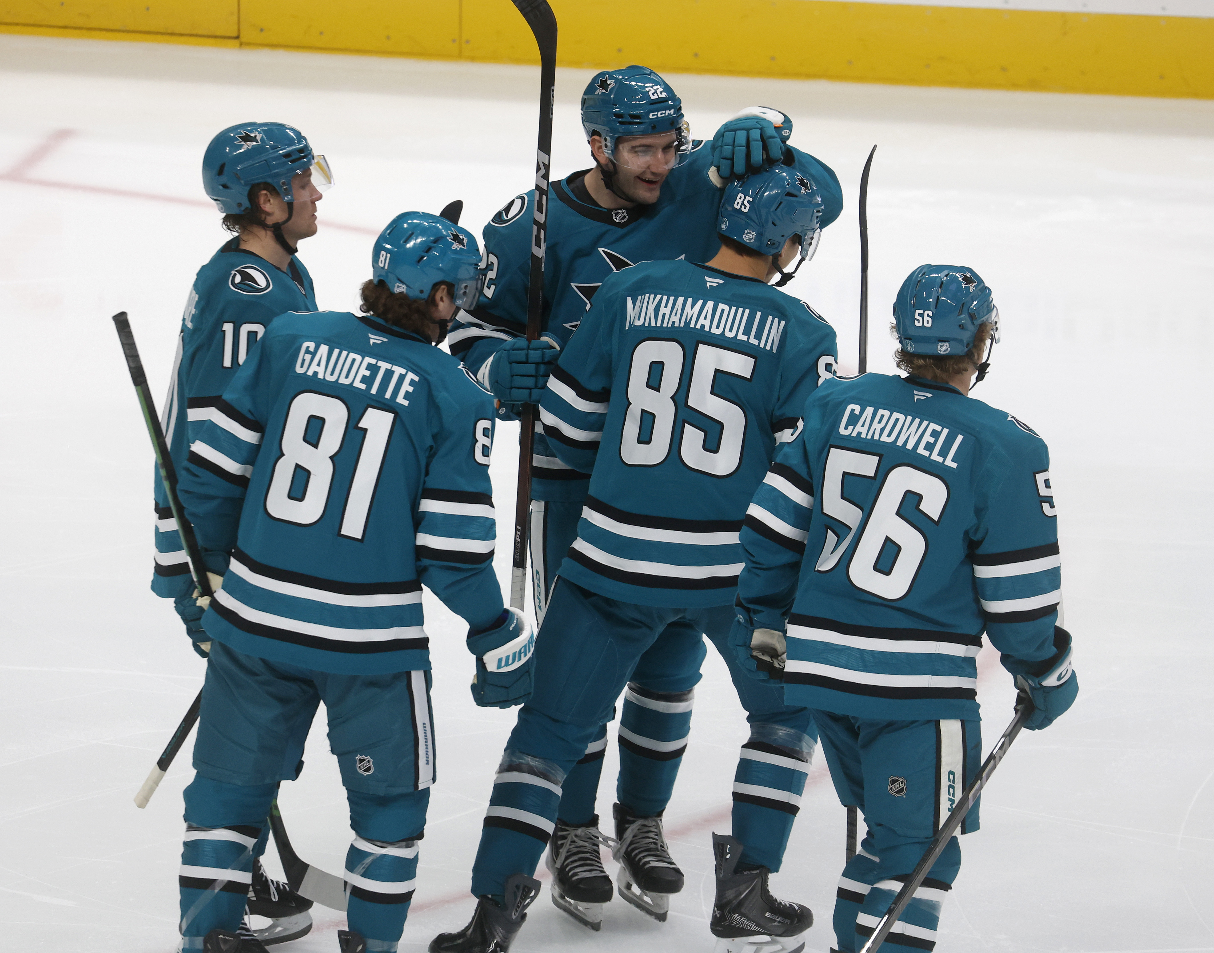 San Jose Sharks’ Shakir Mukhamadullin (85) is congratulated by San...