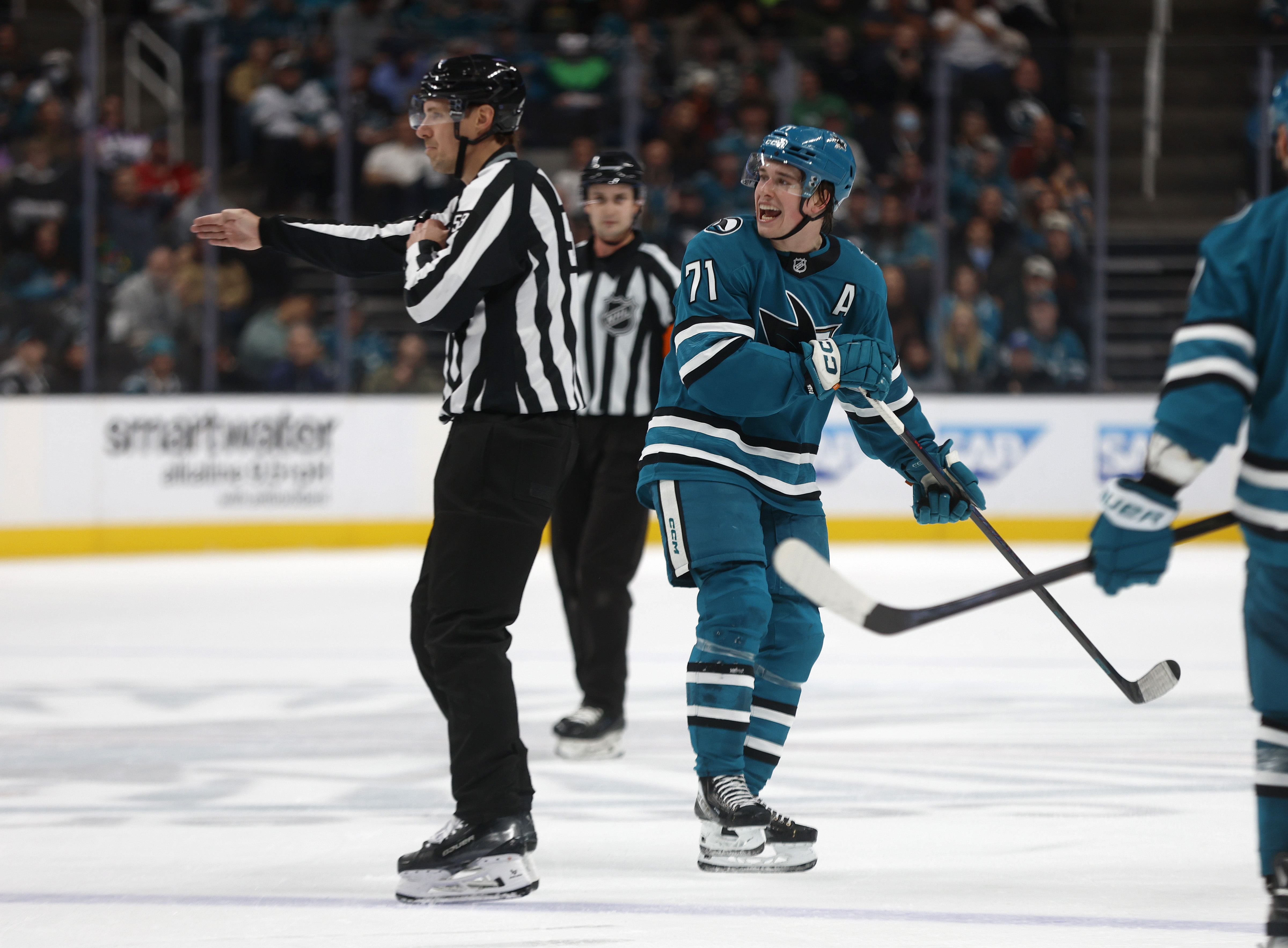 San Jose Sharks’ Macklin Celebrini (71) yells at a referee...