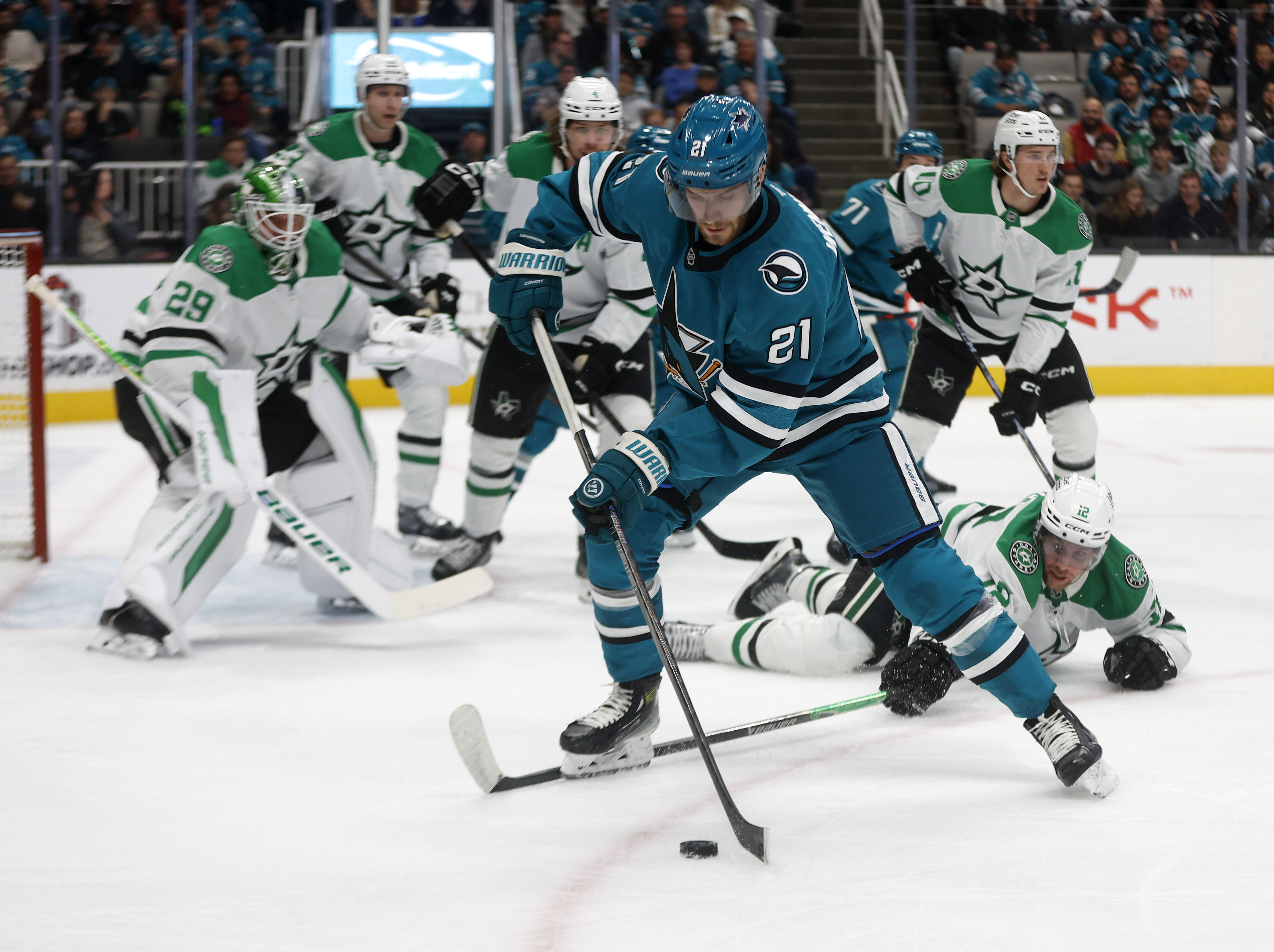 San Jose Sharks’ Alexander Wennberg (21) controls the puck against...
