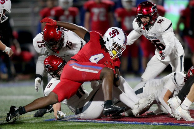 St. Ignatius' Steve Malone #4 high steps during a first quarter touchdown drive against Monte Vista in the CIF NorCal Division 3-AA championship game at St. Ignatius College Preparatory in San Francisco, Calif., Friday, Dec. 5, 2025. (Karl Mondon for the Bay Area News Group)