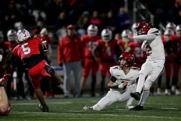 St. Ignatius' Ty Hicks #5 blocks a field goal attempt by Monte Vista's Tyler Palmer #2 in the second half of the CIF NorCal Division 3-AA championship game at St. Ignatius College Preparatory in San Francisco, Calif., Friday, Dec. 5, 2025. (Karl Mondon for the Bay Area News Group)