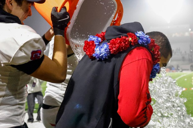 Gatorade is dumped on St. Ignatius' head coach JaJuan Lawson after St. Ignatius won against Ventura during the Division 3-AA state championship football game at Fullerton Union High School District Stadium in Fullerton, Calif., on Friday, Dec. 12, 2025. (Shae Hammond/Bay Area News Group)