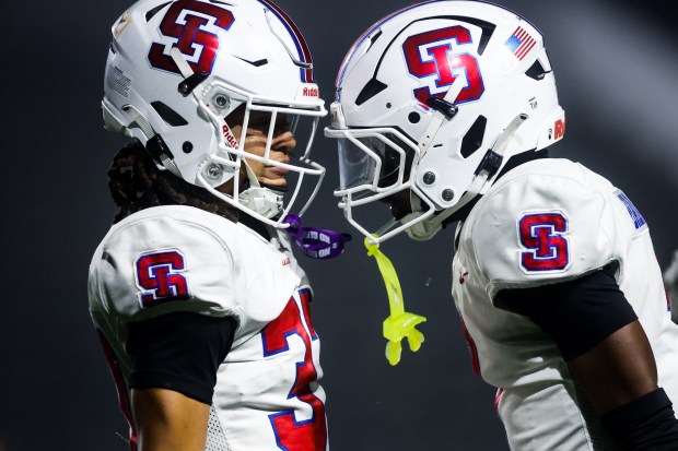 St. Ignatius' Shermar Noriega (37) celebrates a tackle with St. Ignatius' Prince Babalola-Buchango (7) in the fourth quarter during the Division 3-AA state championship football game at Fullerton Union High School District Stadium in Fullerton, Calif., on Friday, Dec. 12, 2025. (Shae Hammond/Bay Area News Group)