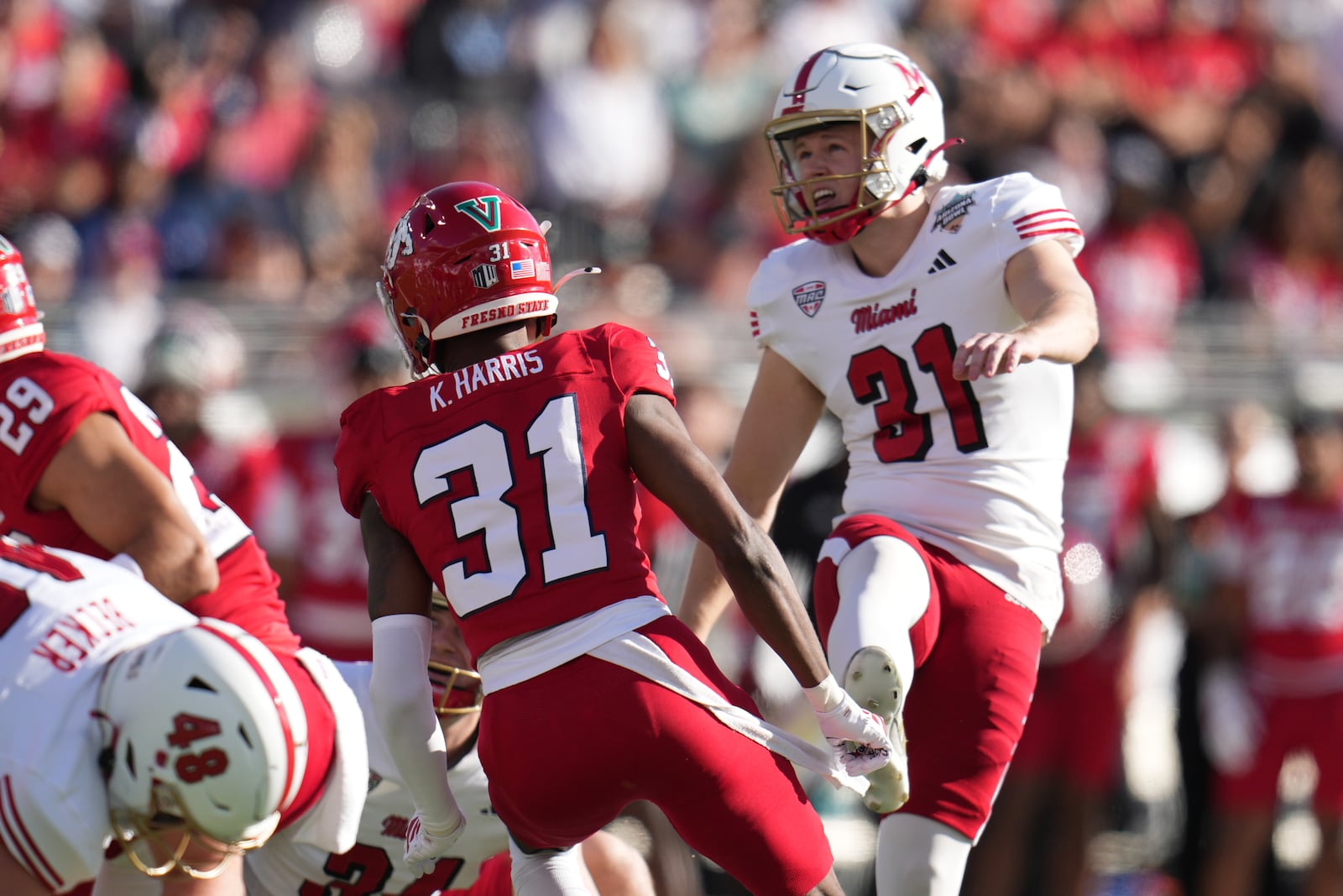Miami (Ohio) kicker Dom Dzioban (31) makes a field goal against Fresno State in the first half of the Snoop Dogg Arizona Bowl NCAA college football game, Saturday, Dec. 27, 2025, in Tucson, Ariz. (AP Photo/Rick Scuteri)